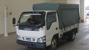 2007 Flat Body Isuzu Elf PB-NKR81A - Image 1